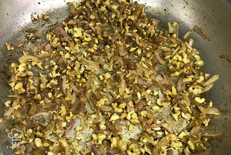 Add the chopped walnuts to the onions