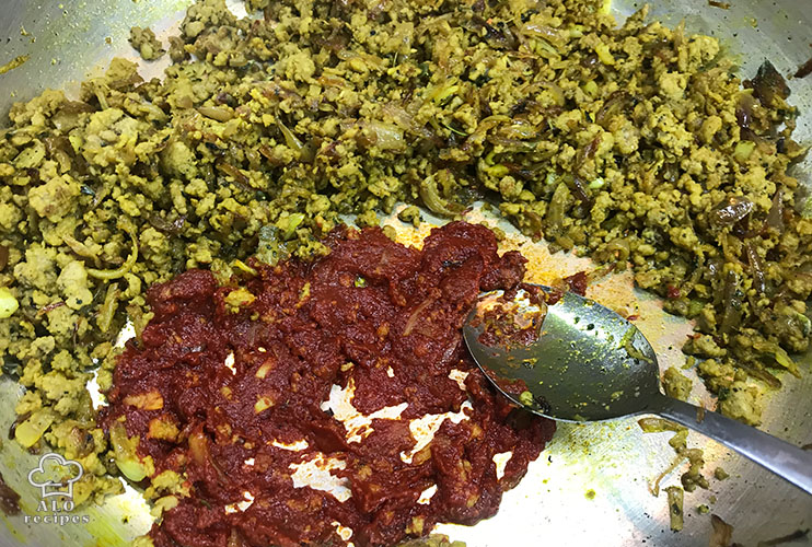 Add tomato paste to ground beef