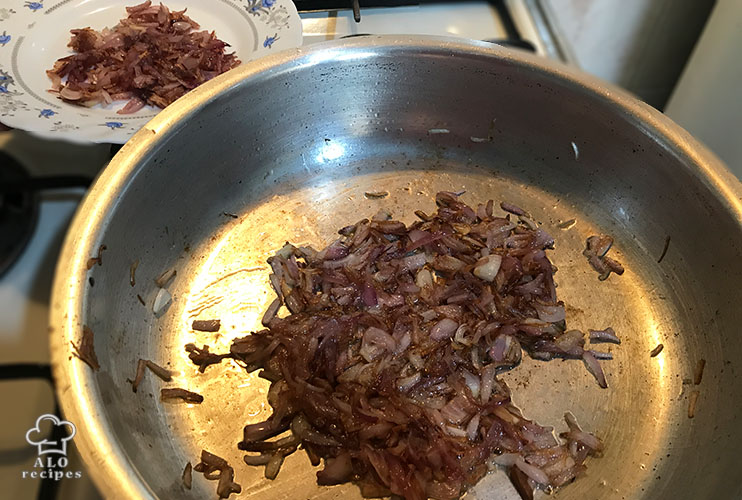 Fry the onions and set aside half of them