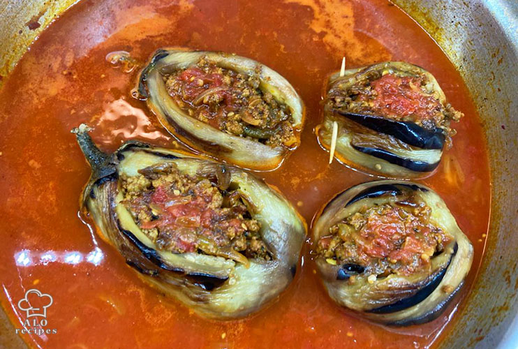 Set the stuffed eggplants into the sauce