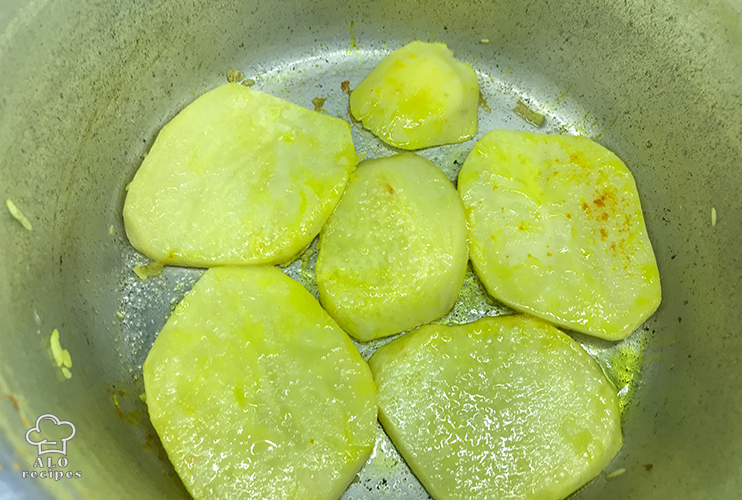 To have Tahdig fry both sides of the potatoes