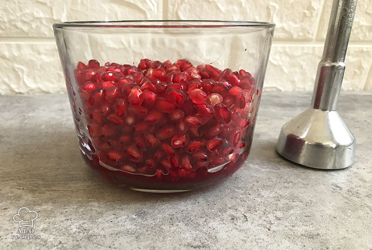 Crush the pomegranate arils