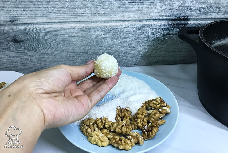 Roll the balls in coconut powder