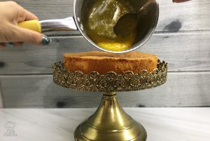 Pouring the Glaze on the Cake